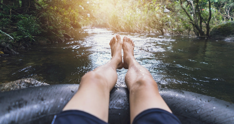 first-person perspective of someone in a tube on the Guadelupe River