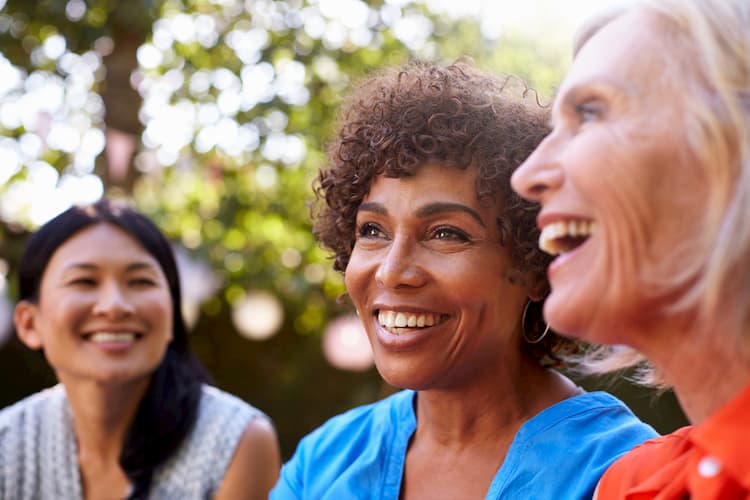 Older women talking and laughing