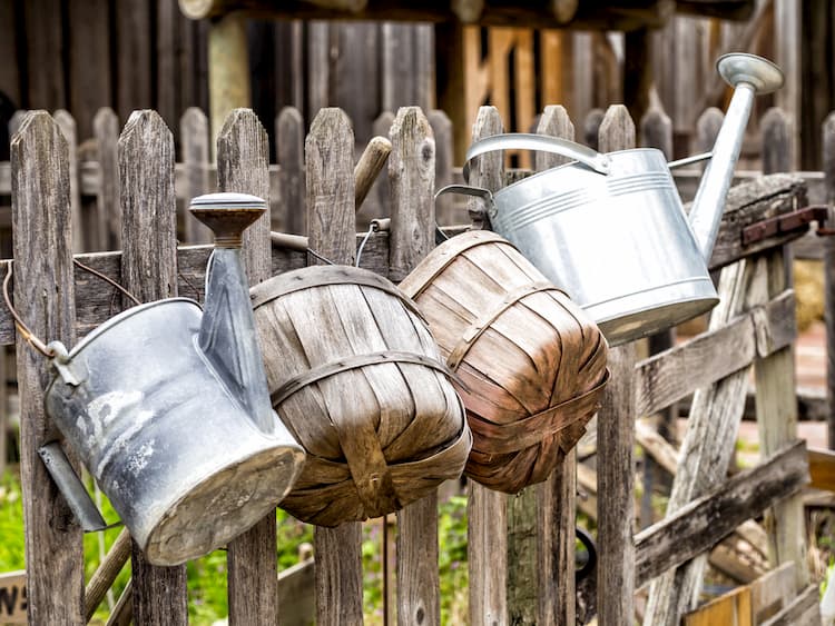 Buckets on fence at Dallas Heritage Village